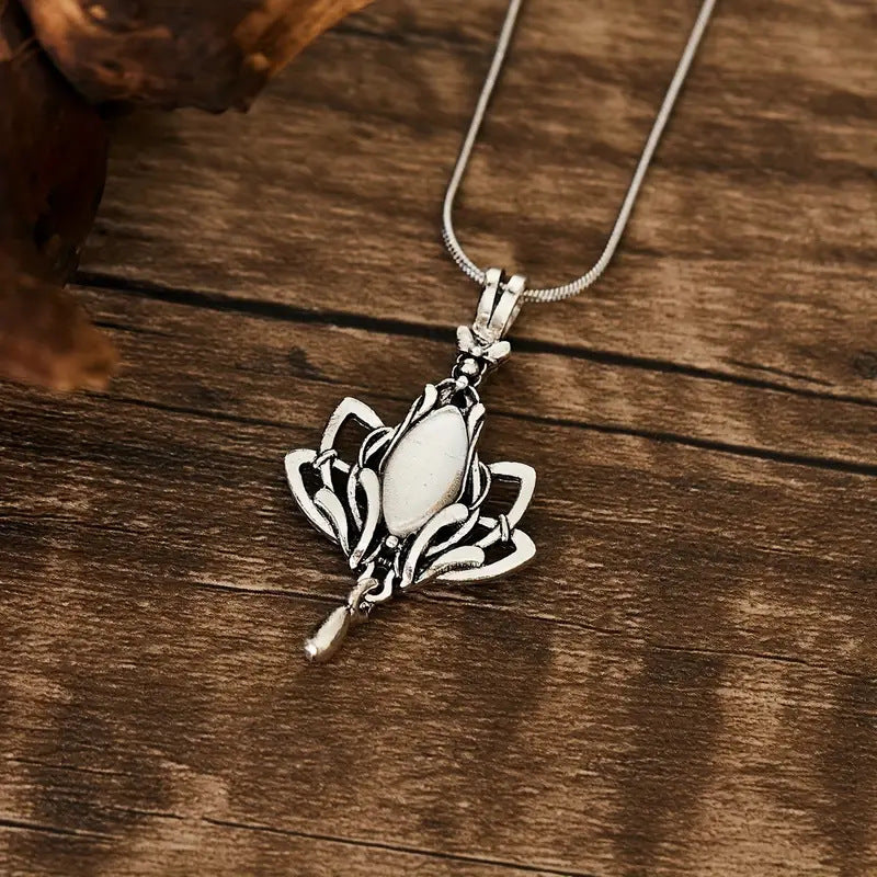 Retro Waterdrop-Shaped Hollow Lotus Pendant