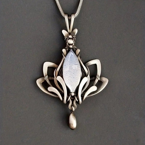 Retro Waterdrop-Shaped Hollow Lotus Pendant