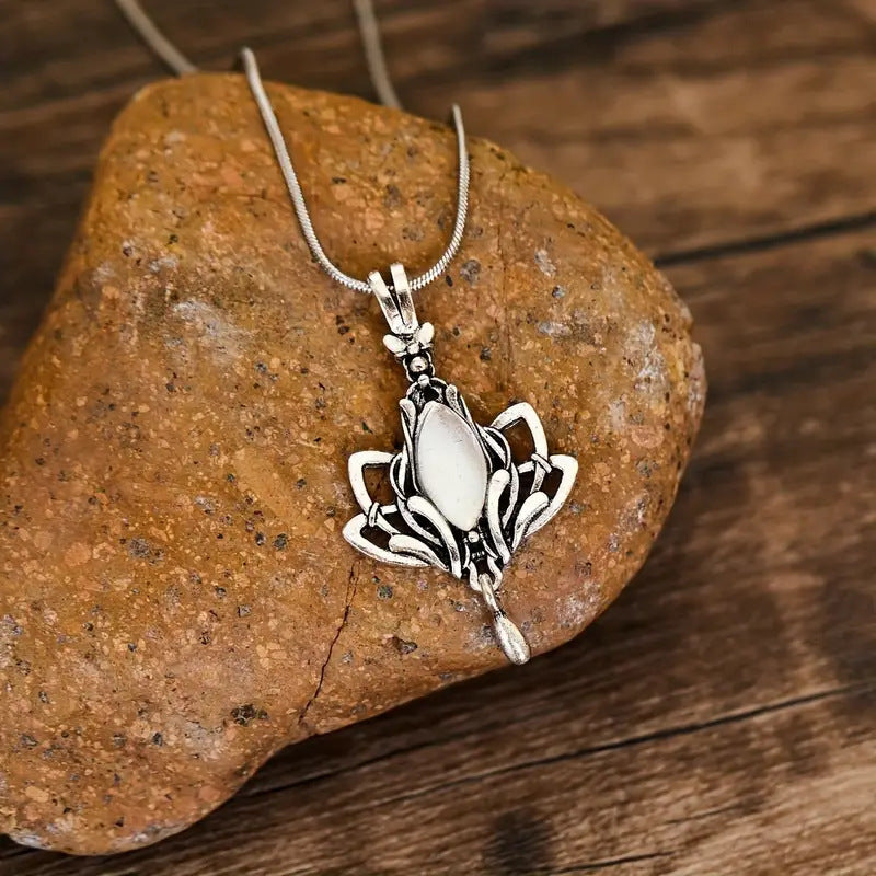 Retro Waterdrop-Shaped Hollow Lotus Pendant