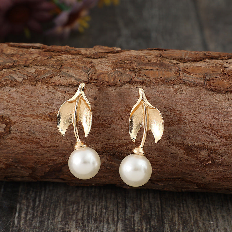 Bohemian-style Leaf-wrapped Pearl Alloy Long Earrings